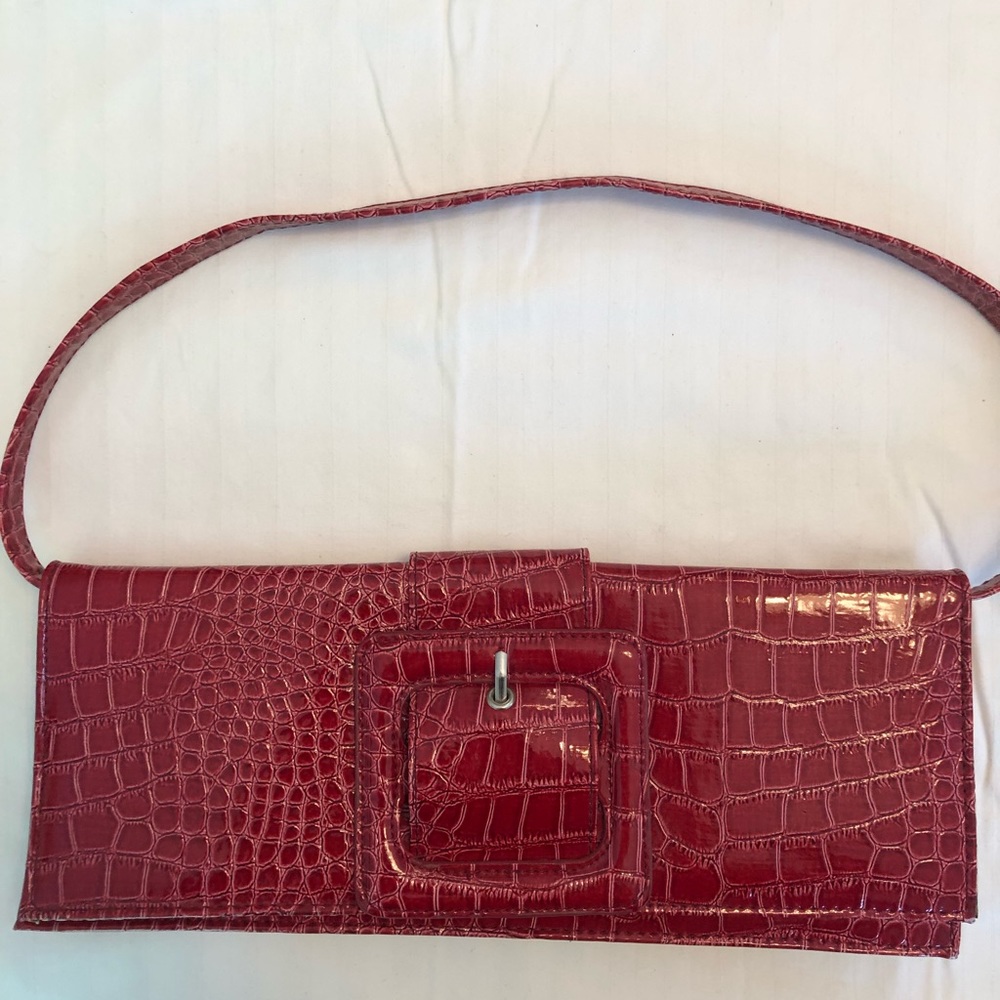 Rose pink, patent leather pocketbook.